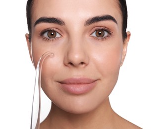 Photo of Woman using high frequency darsonval device on white background, closeup