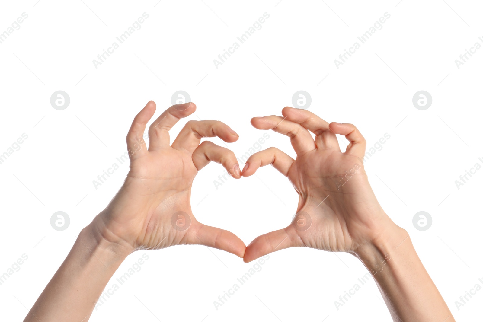 Photo of Woman making heart with her hands on white background, closeup