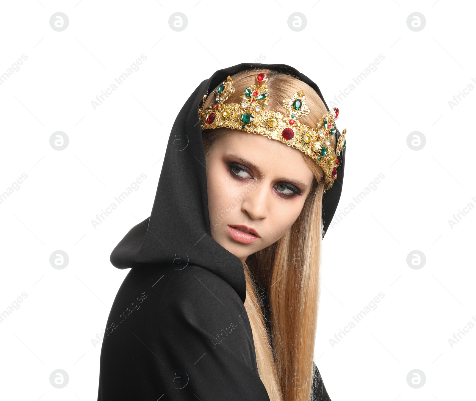 Photo of Witch in black mantle and crown isolated on white. Scary fantasy character