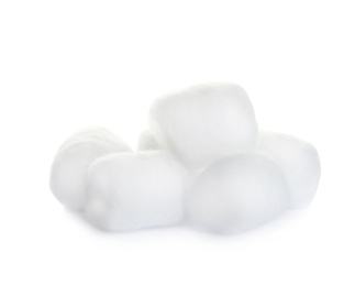 Photo of Balls of fluffy cotton on white background