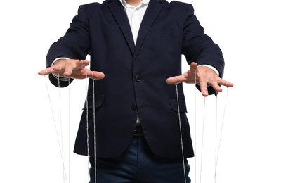 Photo of Man in suit pulling stringspuppet on white background, closeup