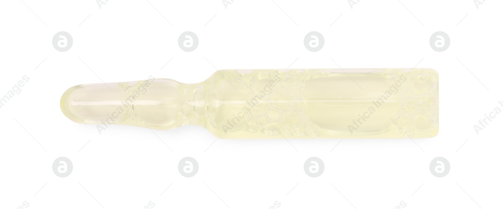 Photo of One glass ampoule with liquid isolated on white, top view