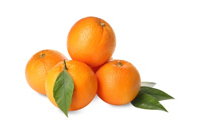 Photo of Fresh ripe oranges with green leaves on white background