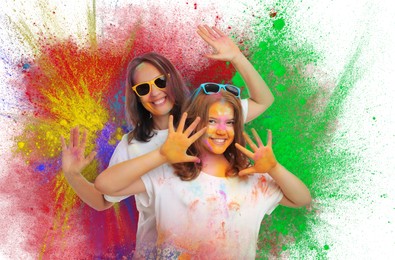 Image of Holi festival celebration. Happy woman and girl covered with colorful powder dyes on white background