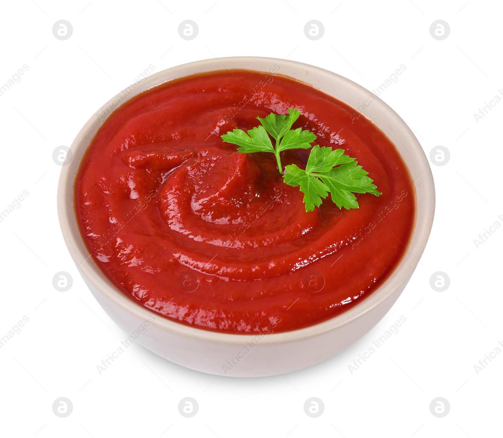 Photo of Organic ketchup and parsley in bowl isolated on white. Tomato sauce