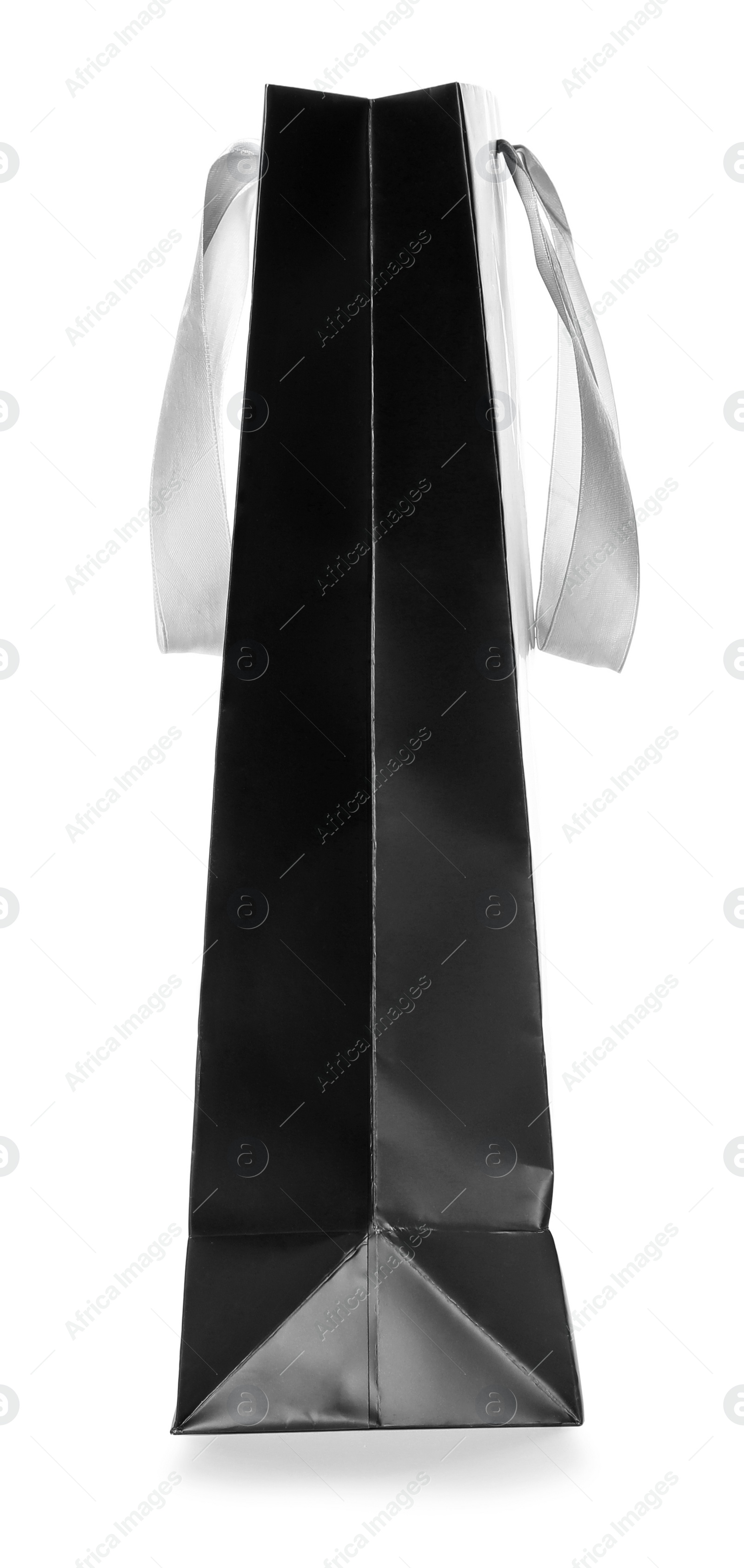 Photo of Paper shopping bag isolated on white, side view