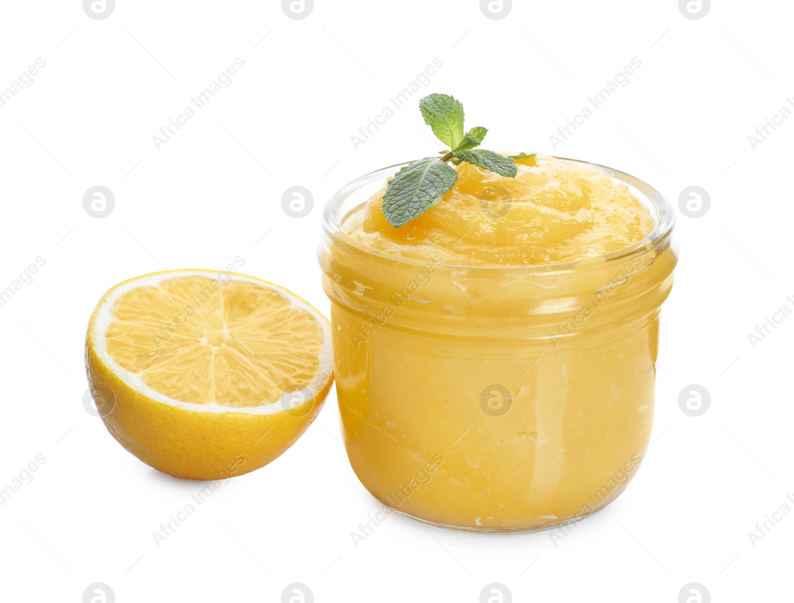 Photo of Delicious lemon curd in glass jar, fresh citrus fruit and mint isolated on white
