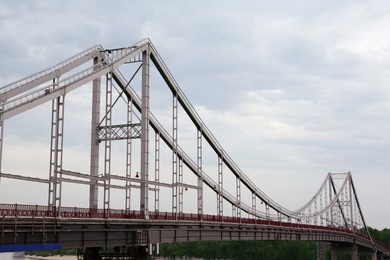 Photo of Beautiful view of modern bridge against cloudy sky