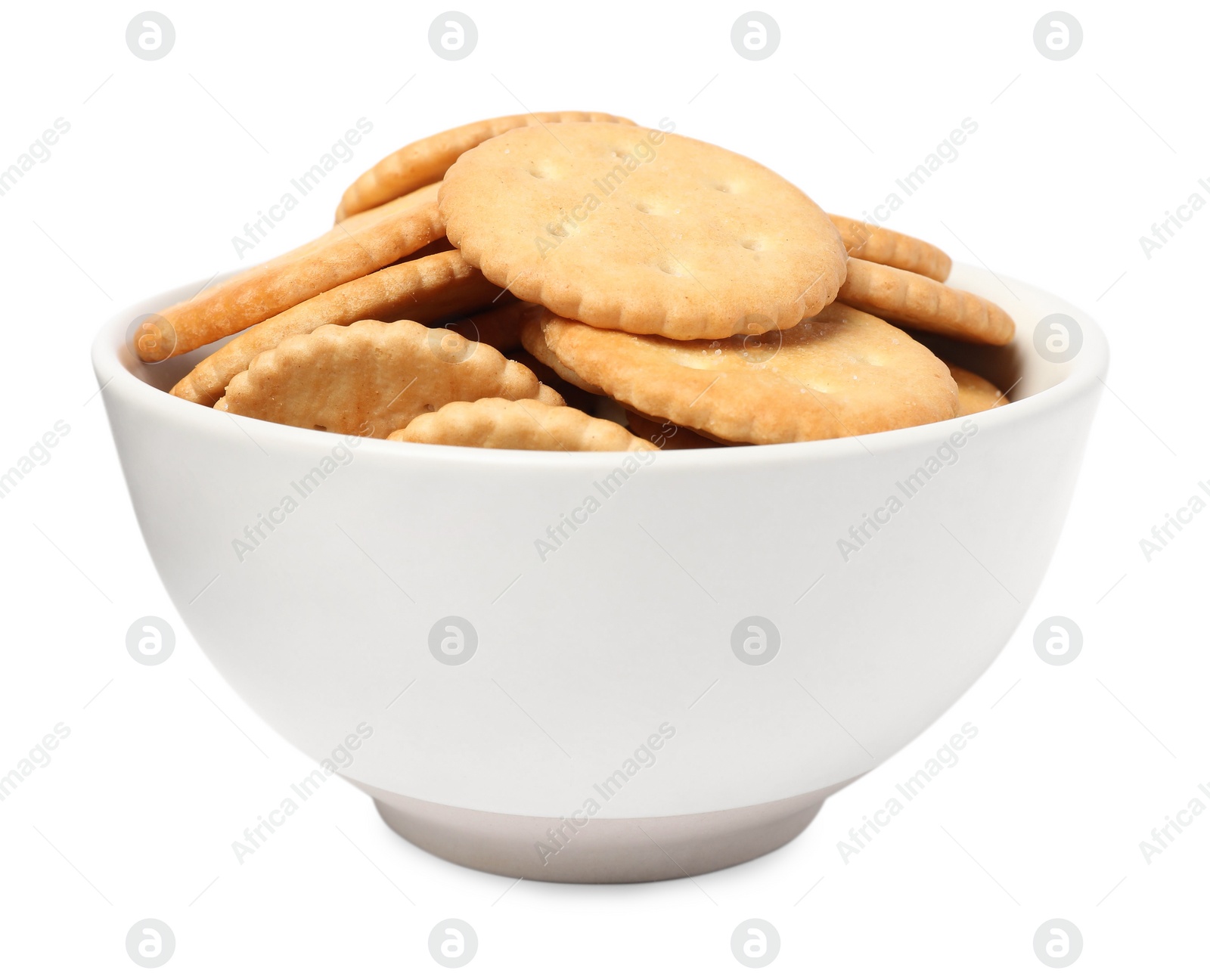 Photo of Tasty crackers in bowl isolated on white