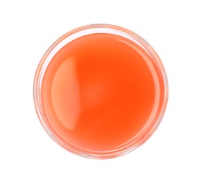 Photo of Tasty freshly made grapefruit juice on white background, top view