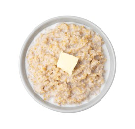 Photo of Tasty wheat porridge with milk and butter in bowl isolated on white, top view