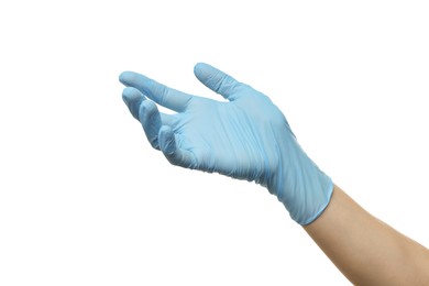 Photo of Doctor wearing light blue medical glove holding something on white background, closeup