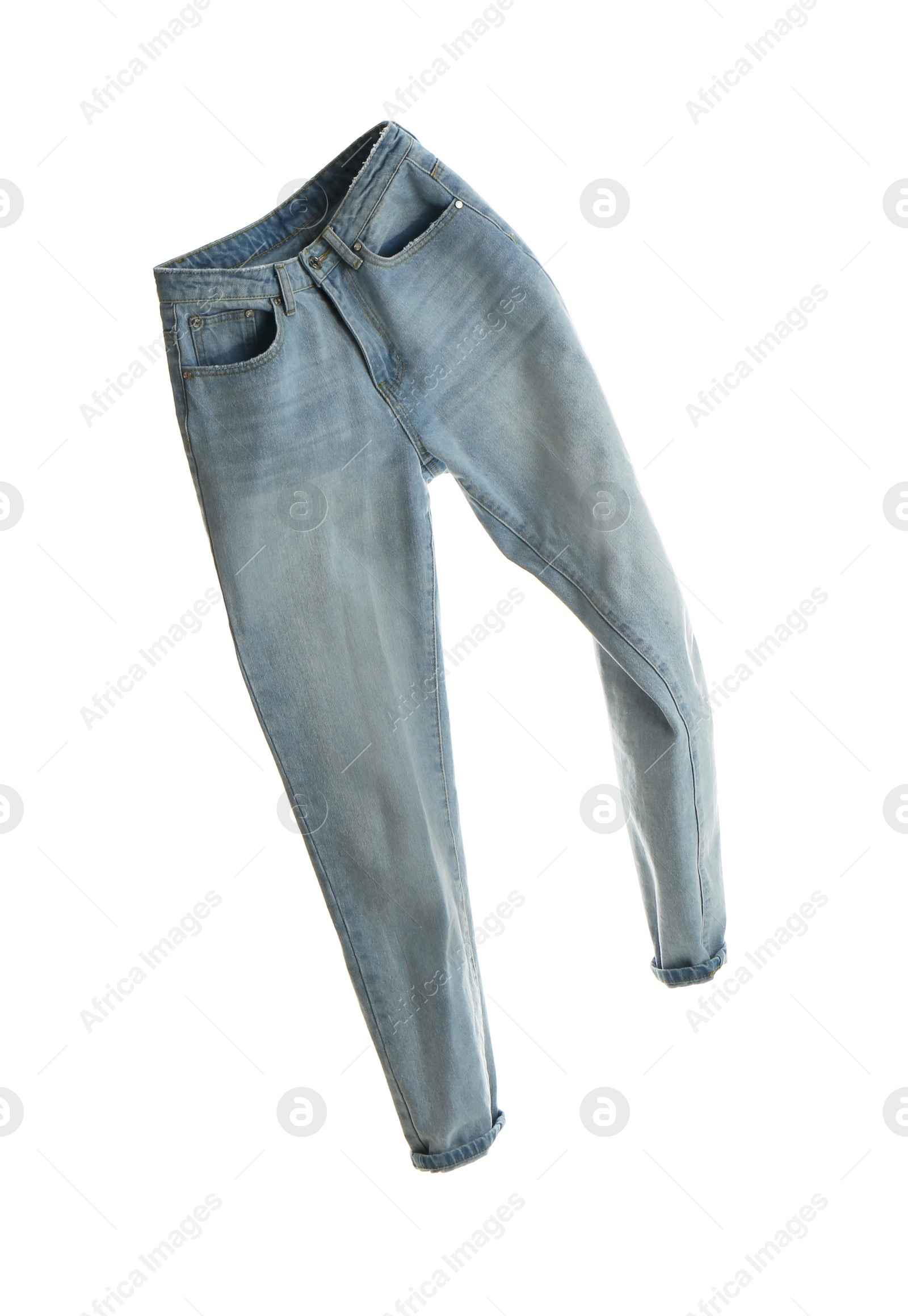 Photo of Blue jeans isolated on white. Stylish clothes