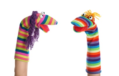 Photo of Funny sock puppets for show on hands against white background