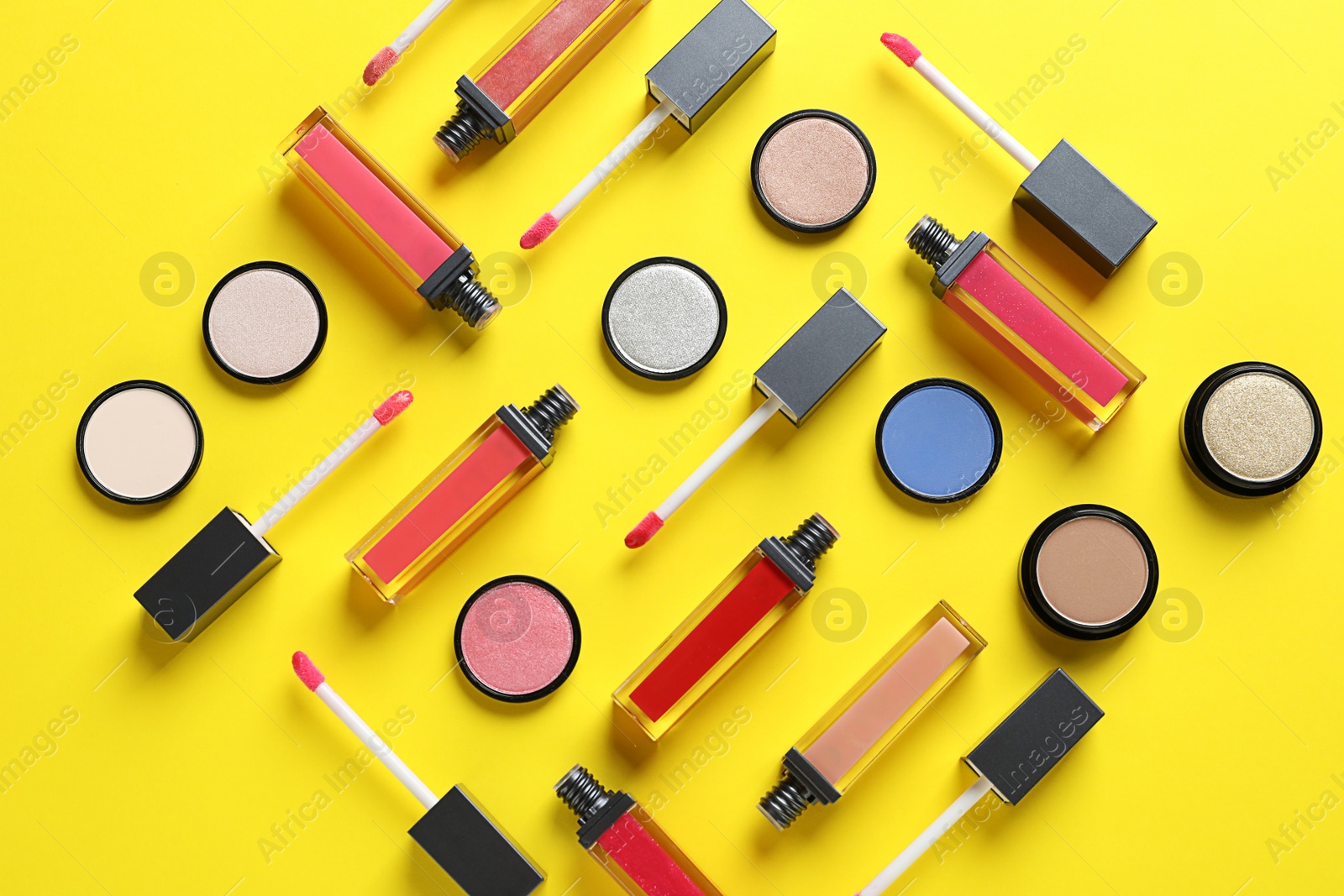 Photo of Composition with lipsticks on color background, flat lay