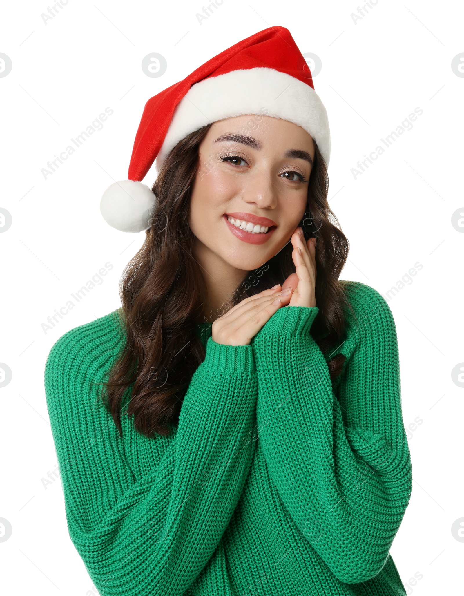 Photo of Christmas celebration. Beautiful young woman in Santa hat isolated on white