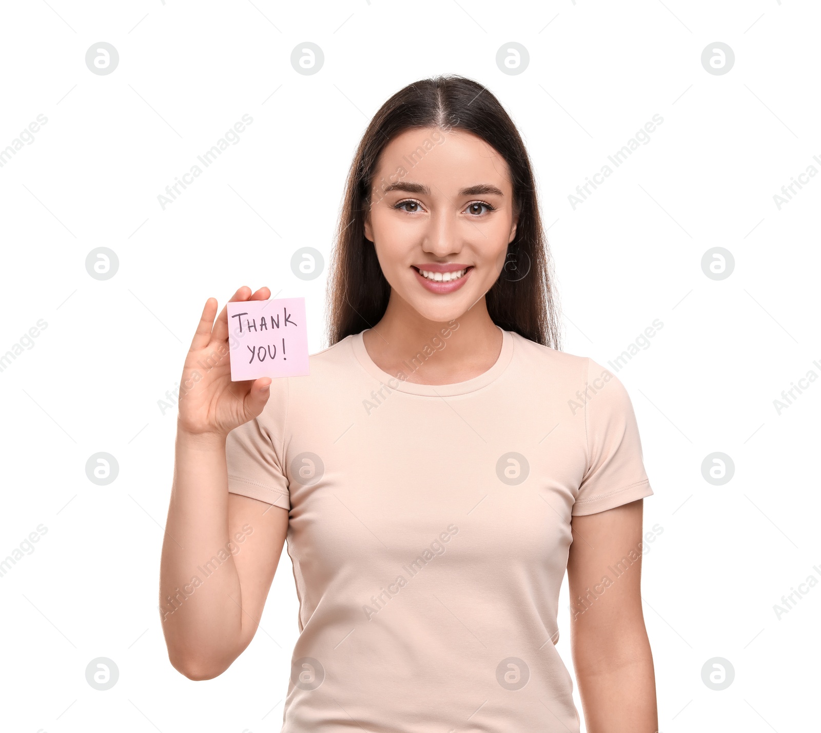 Photo of Happy woman holding paper note with phrase Thank You on white background