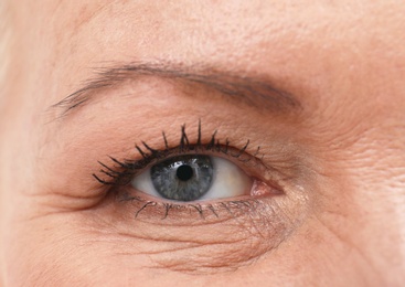 Photo of Beautiful older woman, closeup of eye