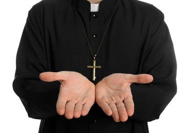 Priest reaching out his hands on white background, closeup