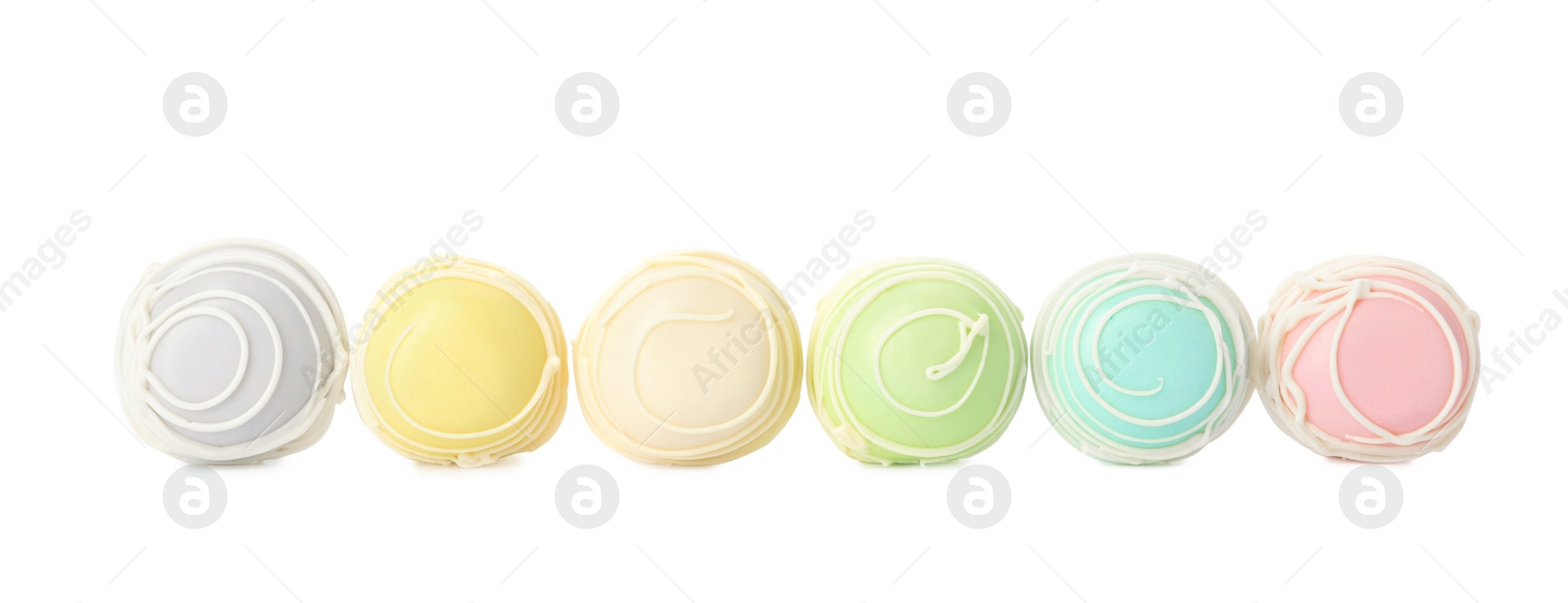 Photo of Sweet colorful cake pops on white background