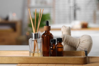 Photo of Spa products on white table in bathroom