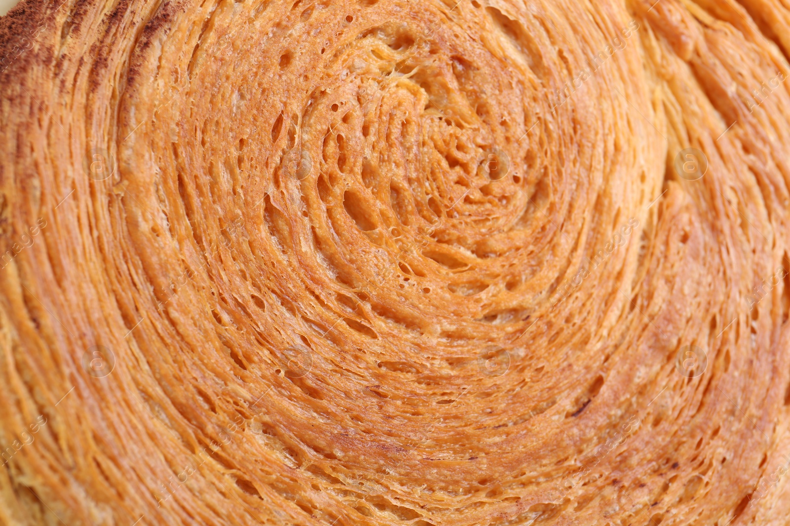 Photo of Tasty puff pastry. Supreme croissant as background, closeup