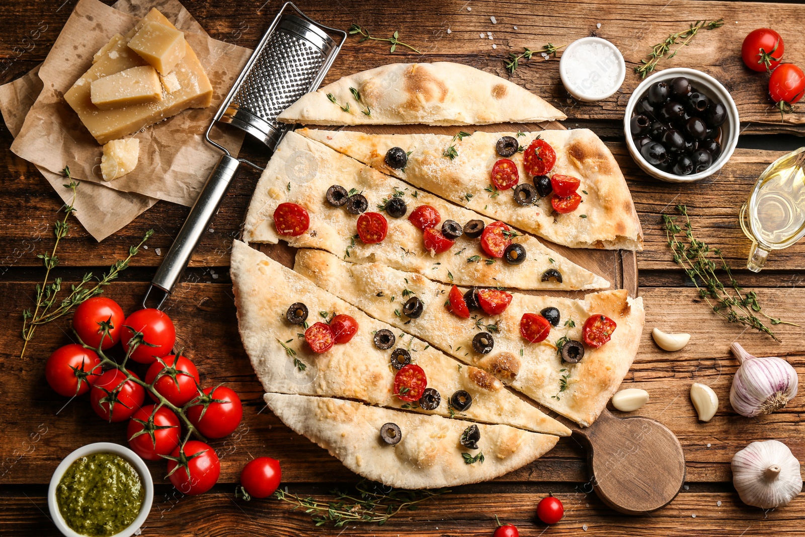 Photo of Flat lay composition with focaccia bread on wooden table