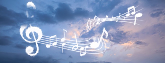 Image of Staff with treble clef and musical notes against sky, banner design