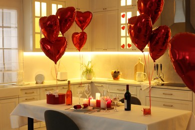 Romantic atmosphere. Cosy kitchen with set table decorated for Valentine day