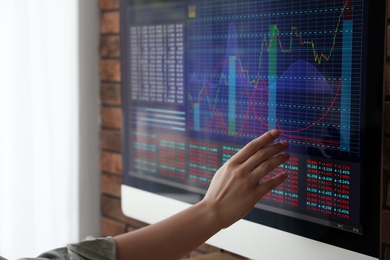 Woman working with modern computer indoors, closeup