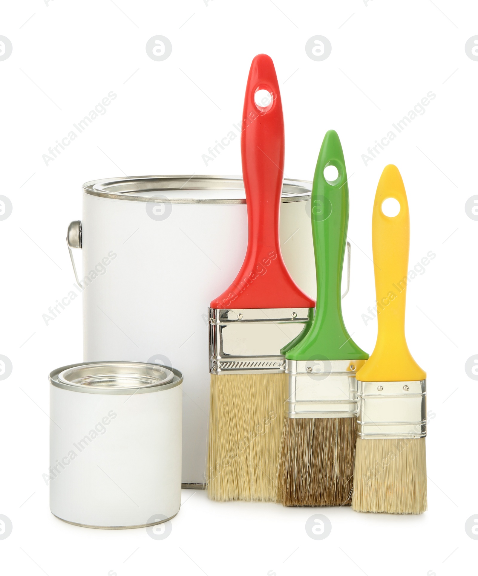 Photo of Paint cans and brushes on white background