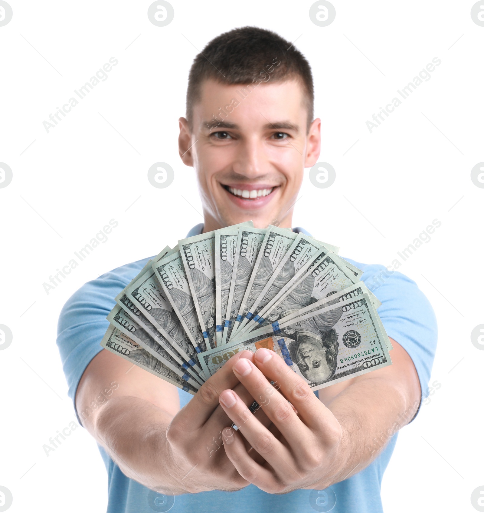 Photo of Handsome young man with dollars on white background