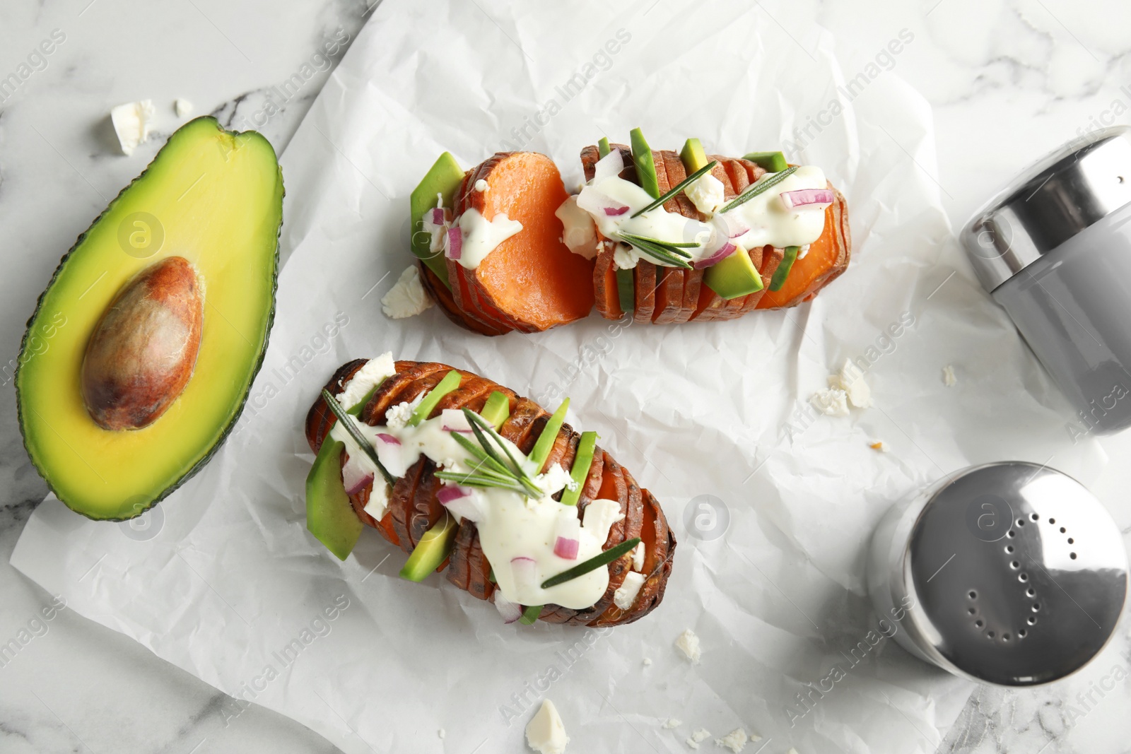 Photo of Flat lay composition with stuffed sweet potatoes on table