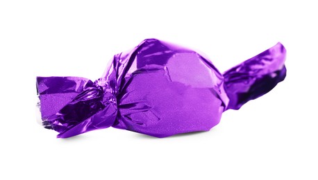 Photo of Candy in purple wrapper isolated on white