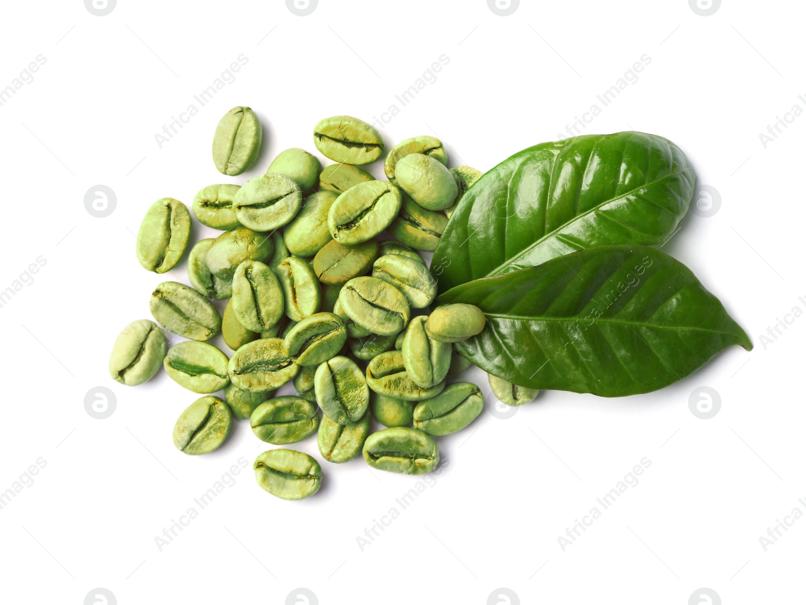 Photo of Green coffee beans and fresh leaves on white background, top view