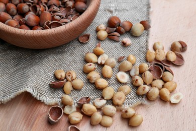 Tasty organic hazelnuts on wooden table. Healthy snack