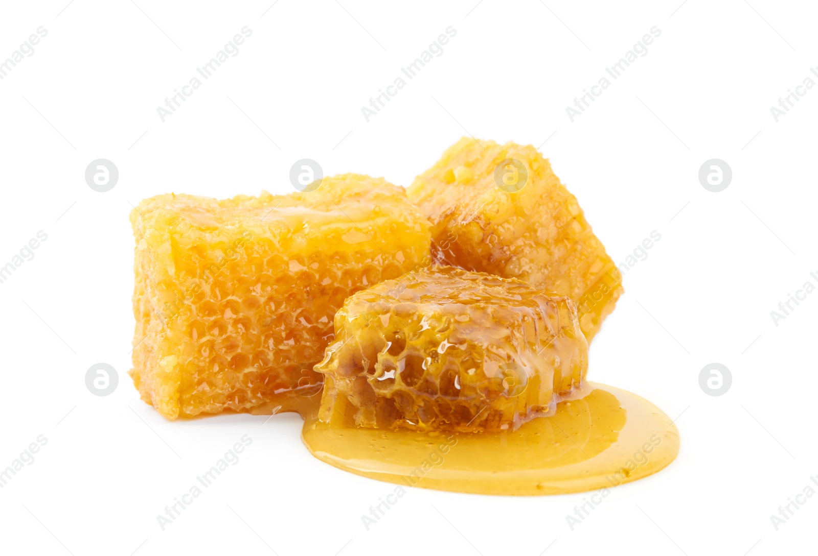 Photo of Pieces of tasty fresh honeycomb isolated on white