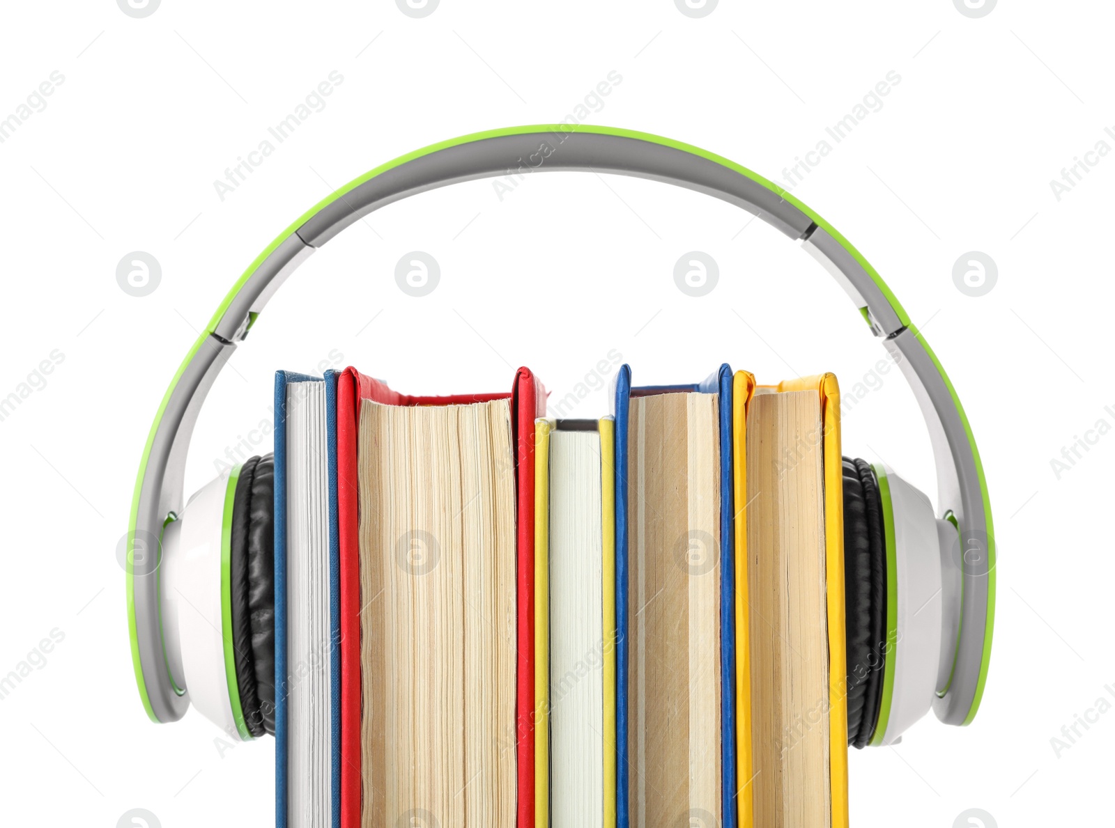 Photo of Books with modern headphones isolated on white