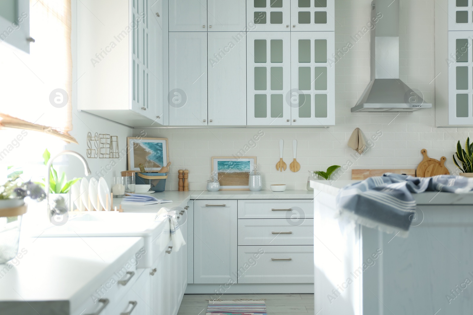 Beautiful kitchen interior with new stylish furniture Photo of Beautiful kitchen interior with new stylish furniture