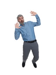 Photo of Mature businessman in stylish clothes avoiding something on white background, above view