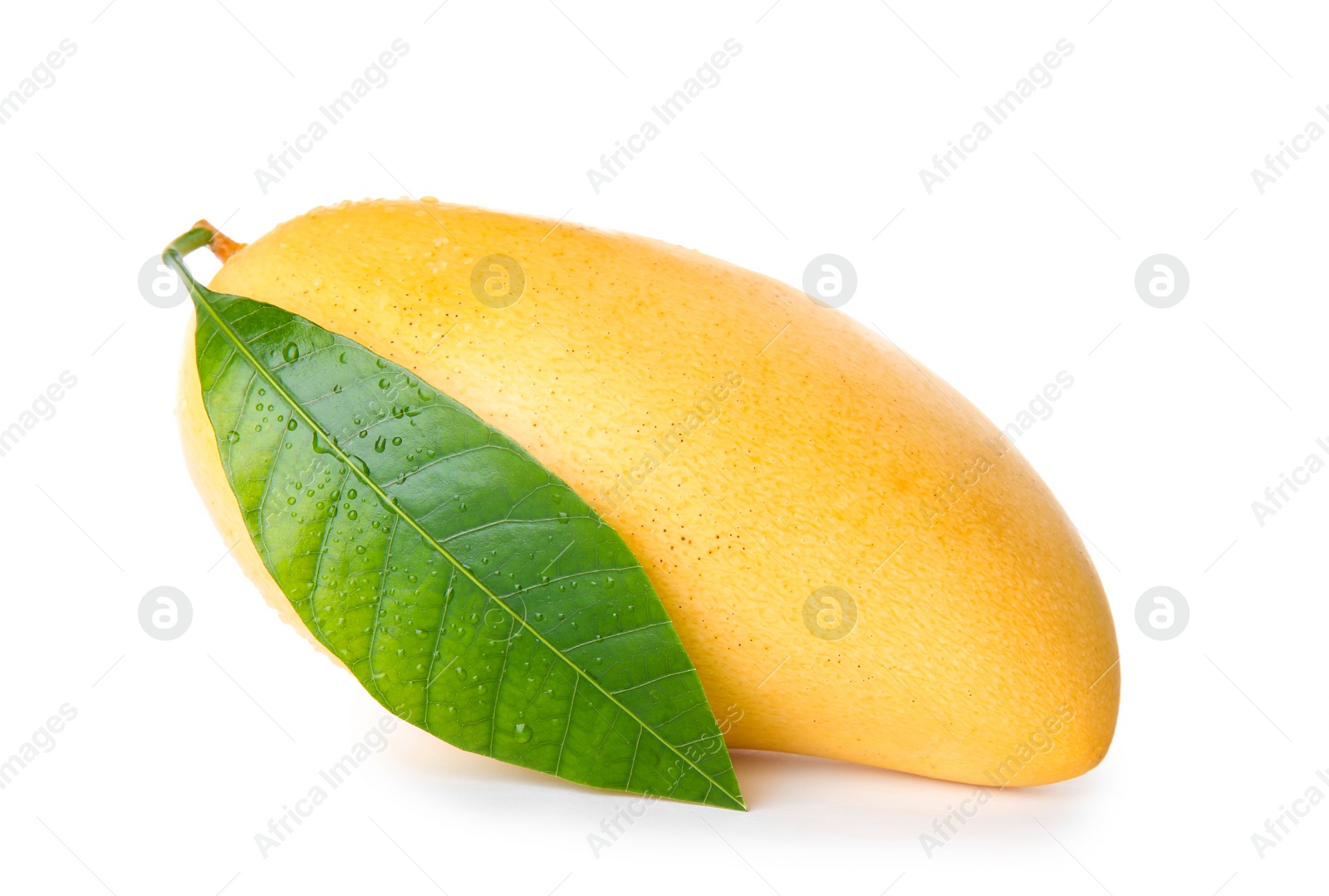 Photo of Fresh ripe mango with green leaf isolated on white