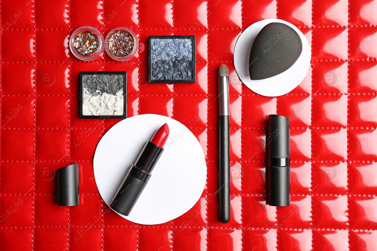 Photo of Flat lay composition with cosmetic products on color background