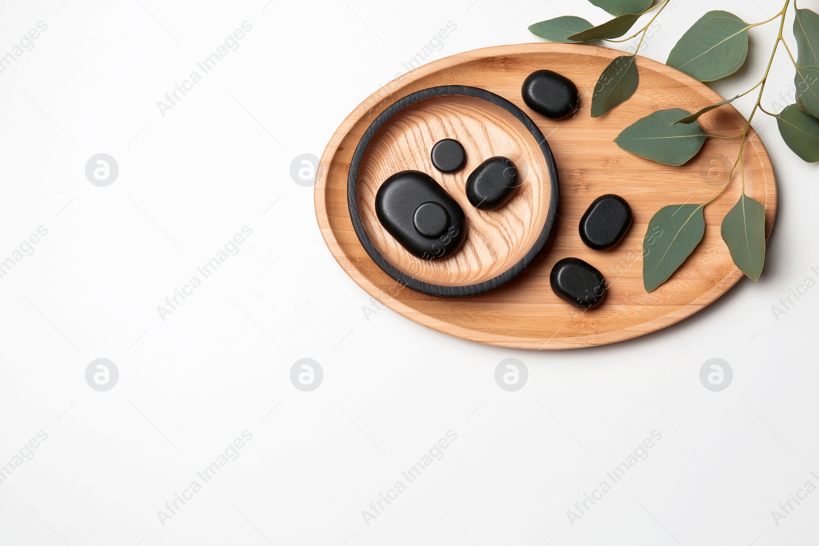 Photo of Flat lay composition with spa stones and space for text on white background