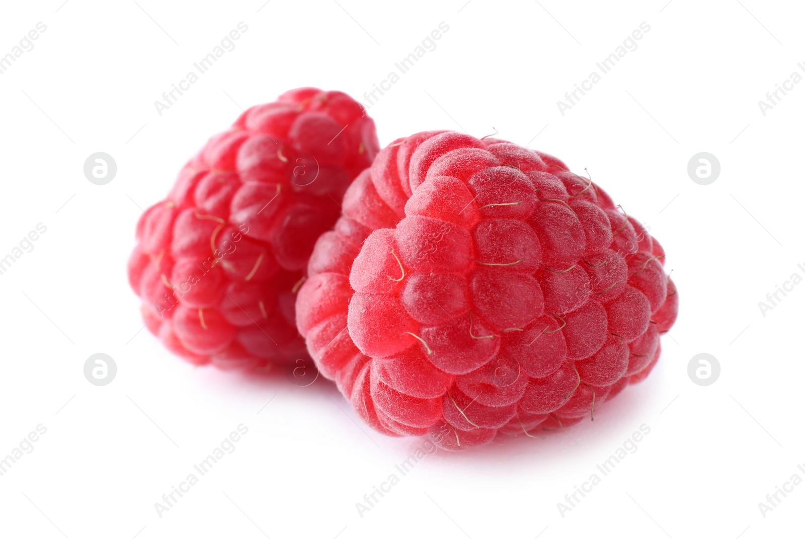 Photo of Delicious sweet ripe raspberries isolated on white