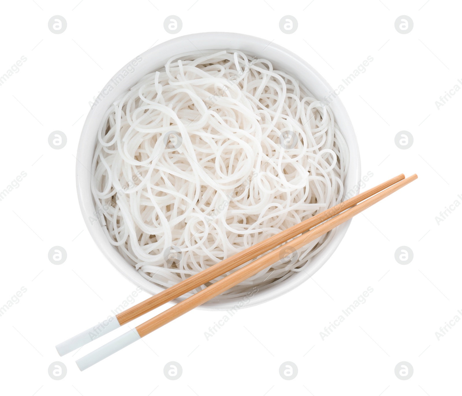 Photo of Bowl with cooked rice noodles and chopsticks isolated on white, top view