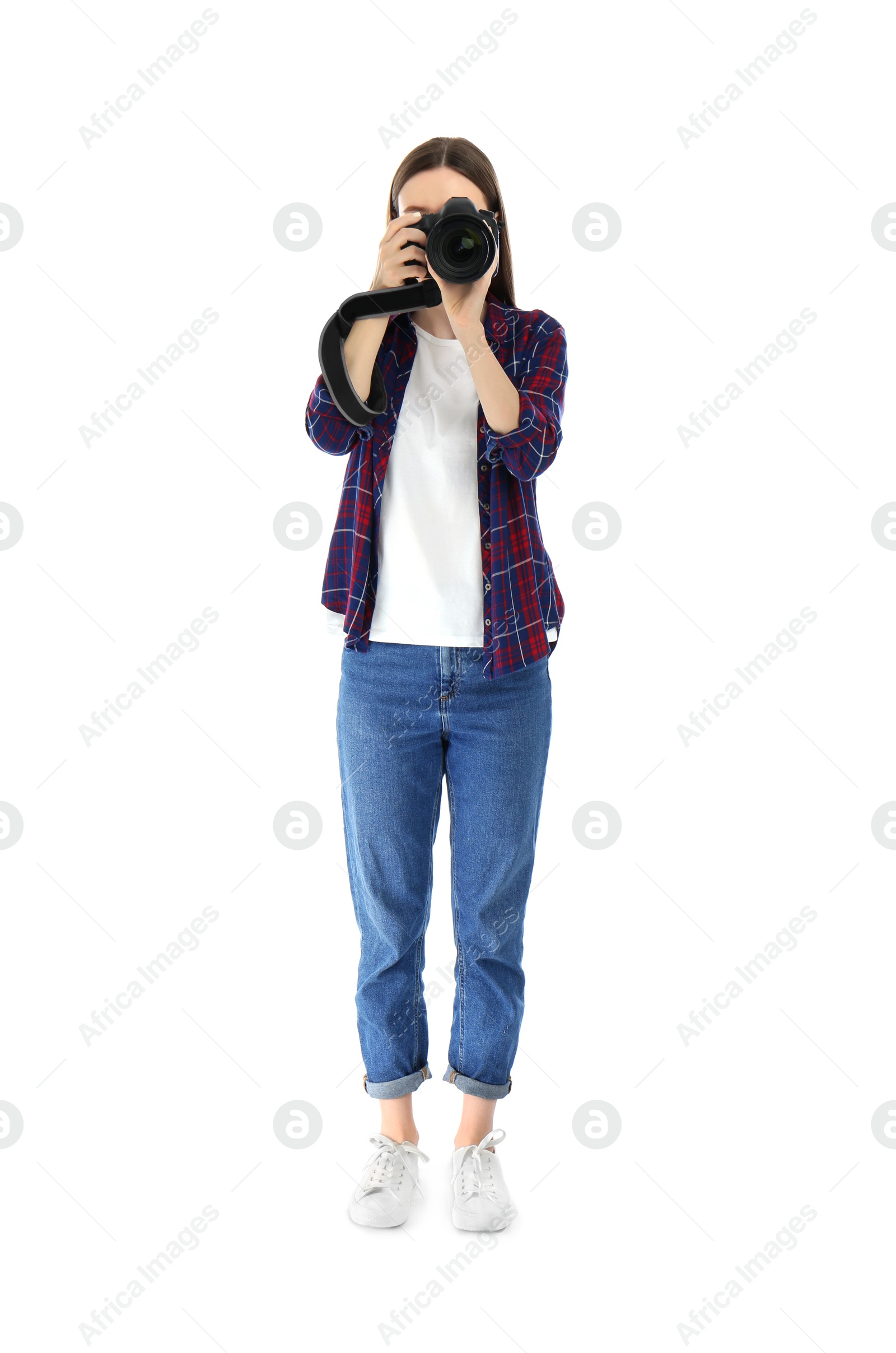 Photo of Professional photographer taking picture on white background