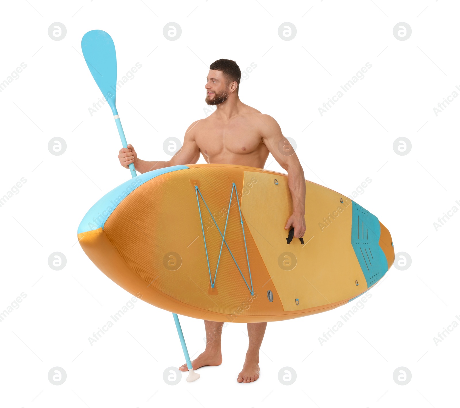 Photo of Handsome man with orange SUP board and paddle on white background