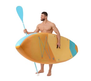 Photo of Handsome man with orange SUP board and paddle on white background