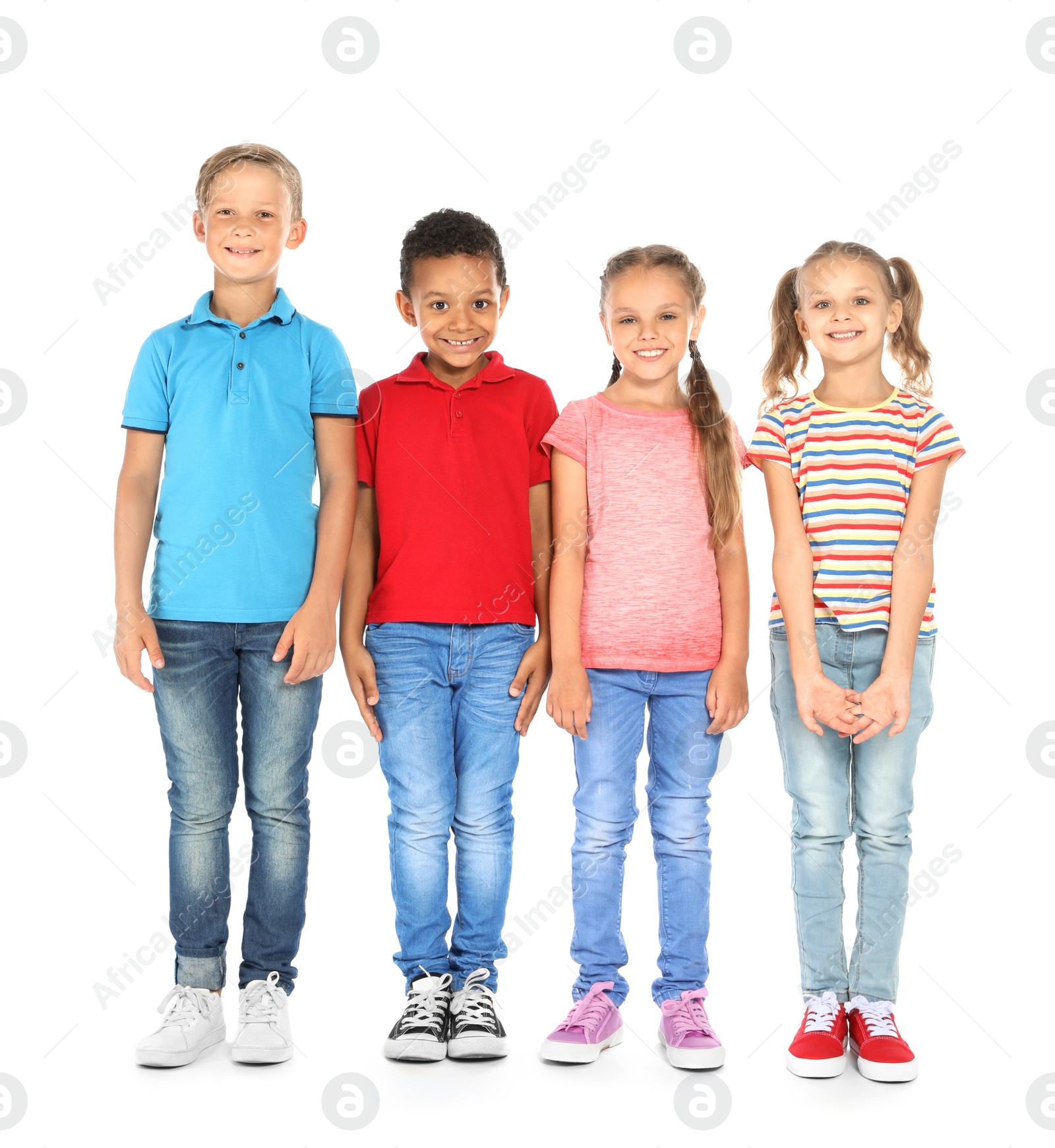 Photo of Group of little school children on white background