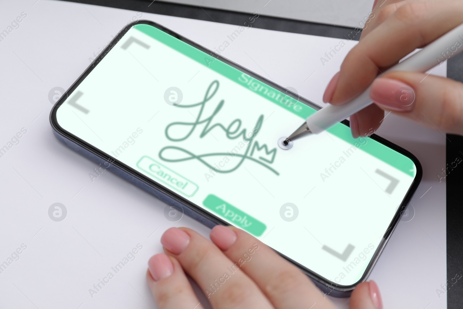 Image of Electronic signature. Woman using stylus and mobile phone, closeup